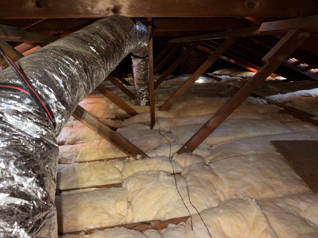 Insulated air ducts installed in attic space to improve HVAC efficiency and indoor air quality in Indiana home
