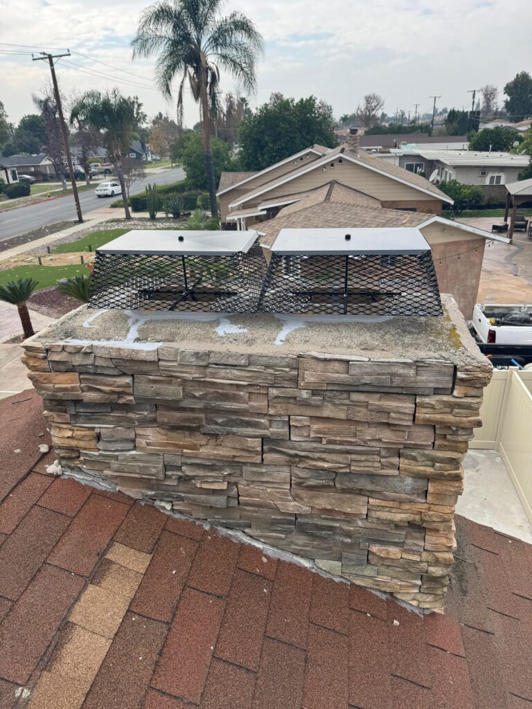 Chimney cap installed on a residential chimney to prevent debris and animals in Indiana