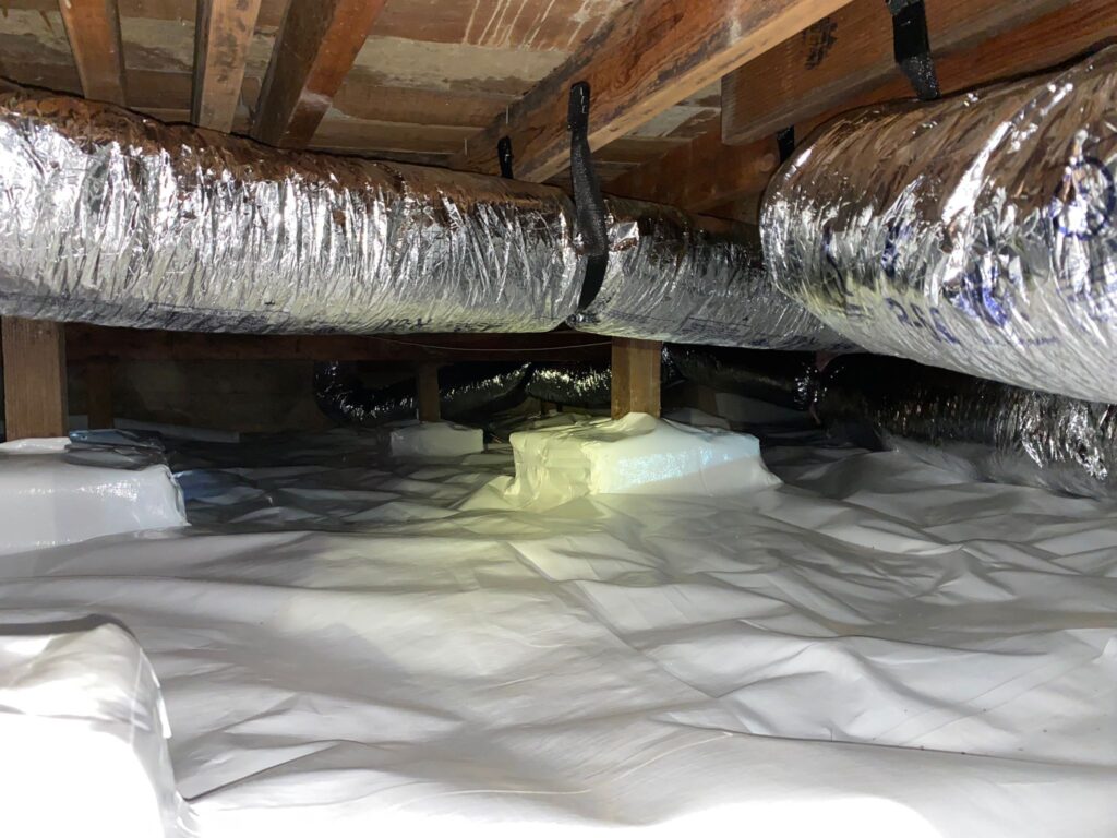New air duct replacement installed in a crawl space to improve airflow and HVAC efficiency in an Indiana home